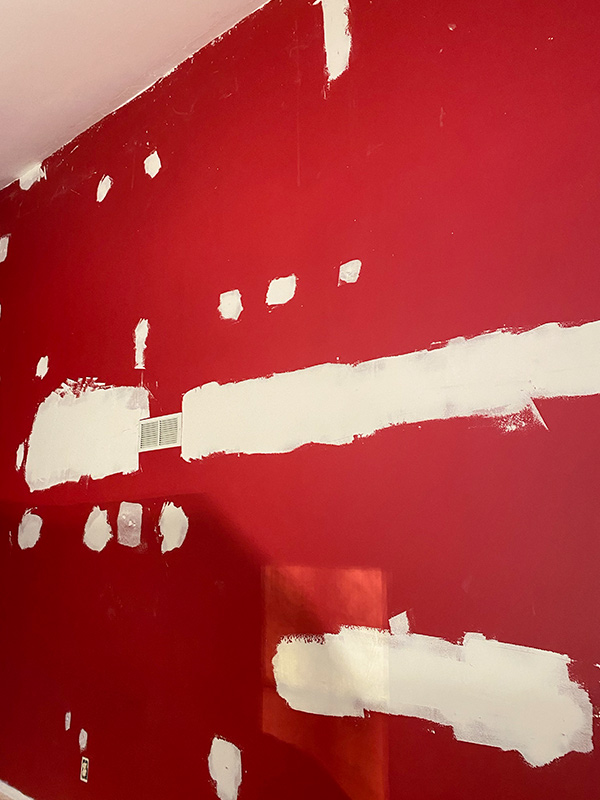red wall painting before 11